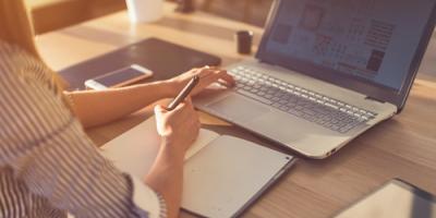 Student on laptop image Remote Proctored Exam