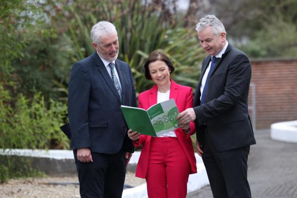 Photograph of QQI CEO, Dr Padraig Walsh, Marie Gould, Head of Tertiary Education Monitoring and Review, QQI; and Paddy Lavelle, General Secretary, Education and Training Boards Ireland - looking at the new sectoral report on the quality of FET in education and training boards.