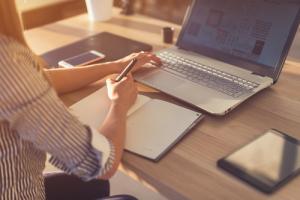 Student on laptop image Remote Proctored Exam