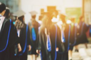 Procession of learners in graduation robes