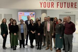 alt="a group photo of participants in the quality dialogue meeting at the Louth Meath Education and Training Board in 2025."